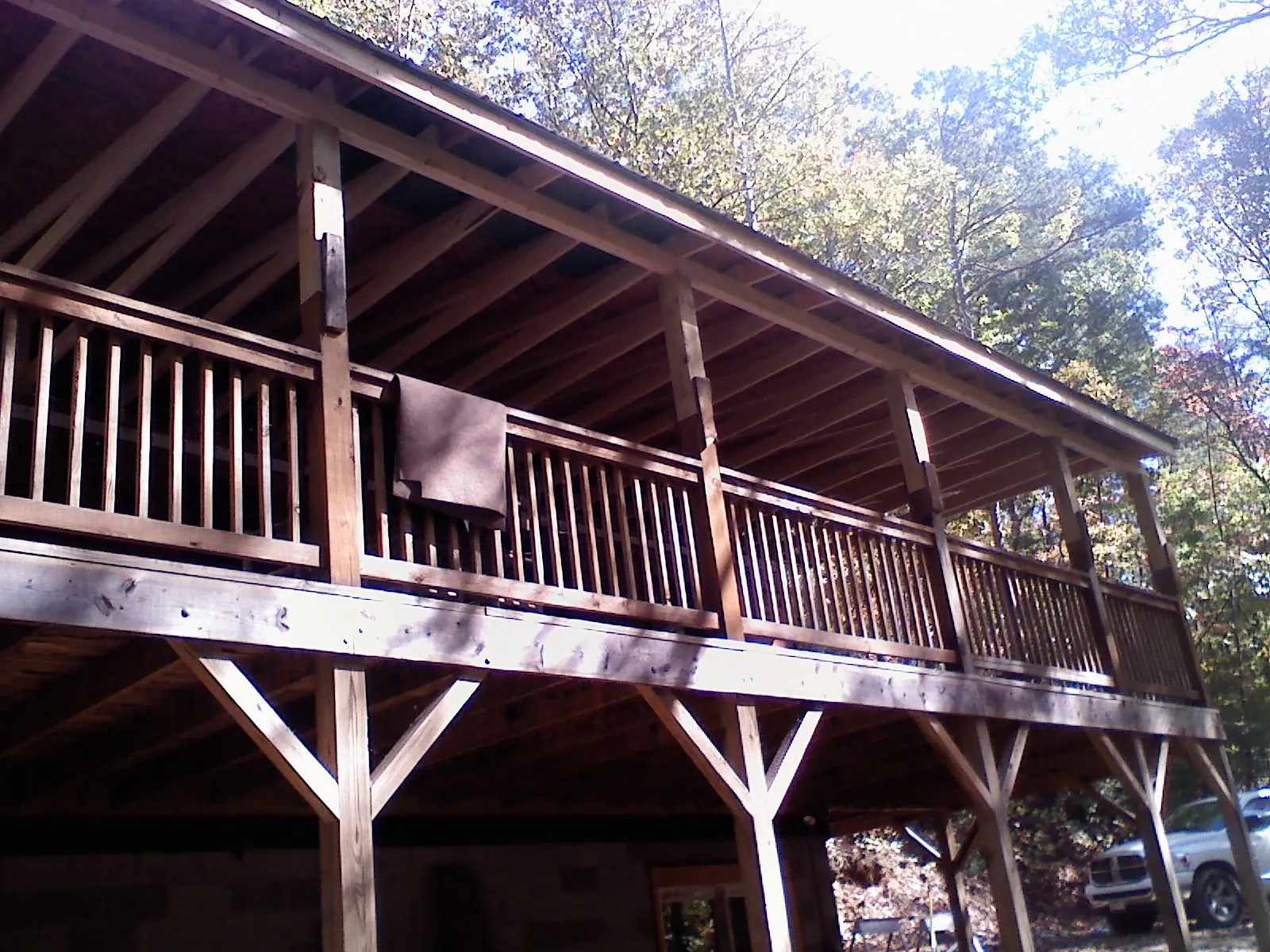 Timber framing under a new elevated porch and deck — Roof Leak Repair in Tryon by Roofing Brothers